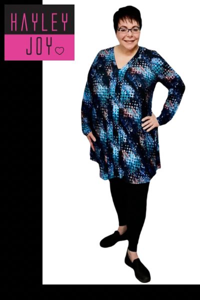 Hayley is wearing a Blue Night Sky Miracle straight hem stolling top with black leggings