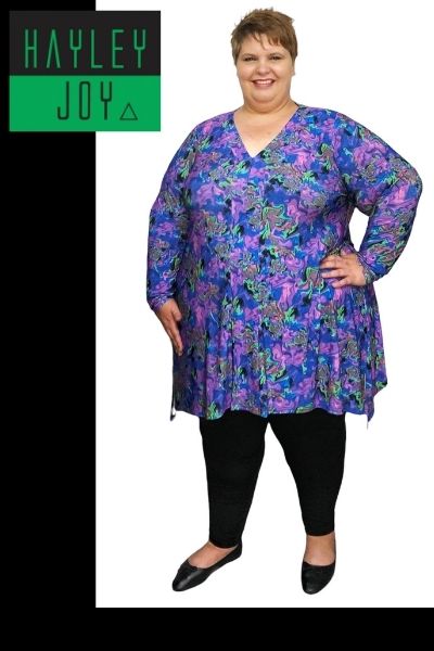 Nadia wears a Plus size 5XL Miracle stolling side point top and 6XL black bion bon leggings